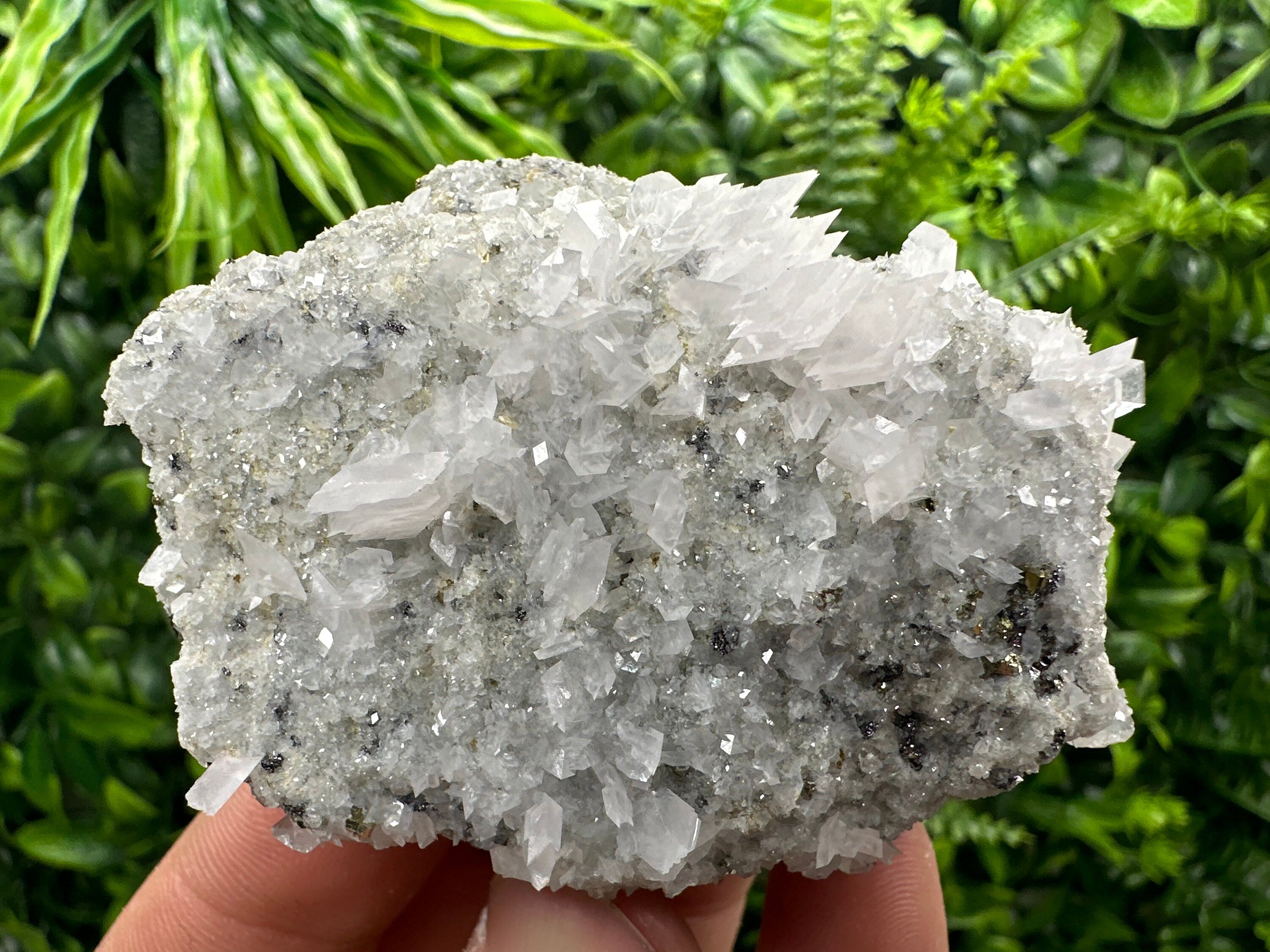 Calcite & Pyrite on Quartz Crystal: Borieva Mine, Bulgaria