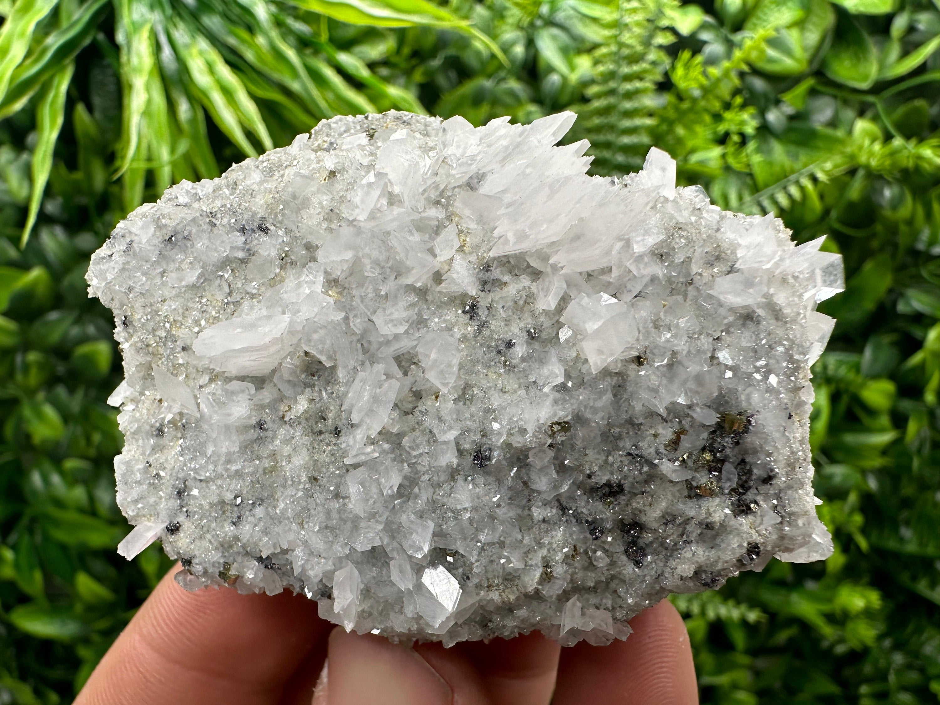 Calcite & Pyrite on Quartz Crystal: Borieva Mine, Bulgaria