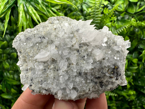 Calcite & Pyrite on Quartz Crystal: Borieva Mine, Bulgaria