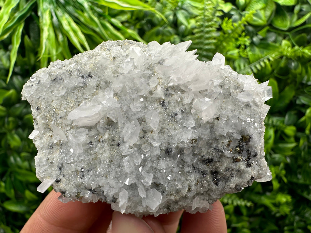 Calcite & Pyrite on Quartz Crystal: Borieva Mine, Bulgaria