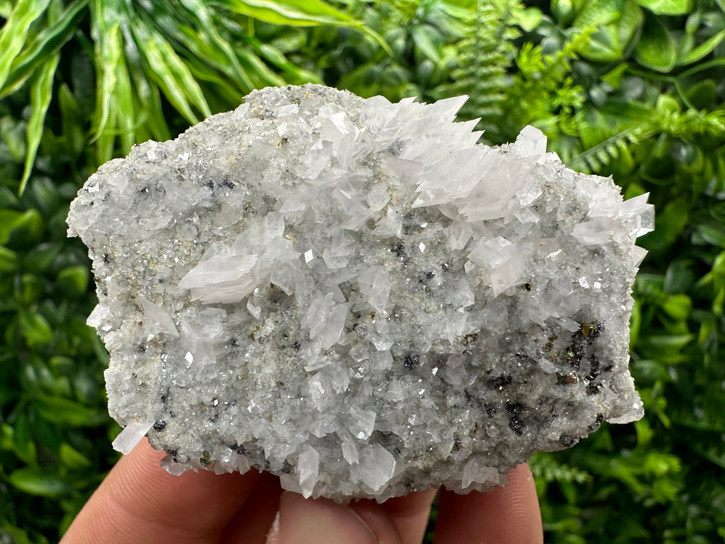 Calcite & Pyrite on Quartz Crystal: Borieva Mine, Bulgaria