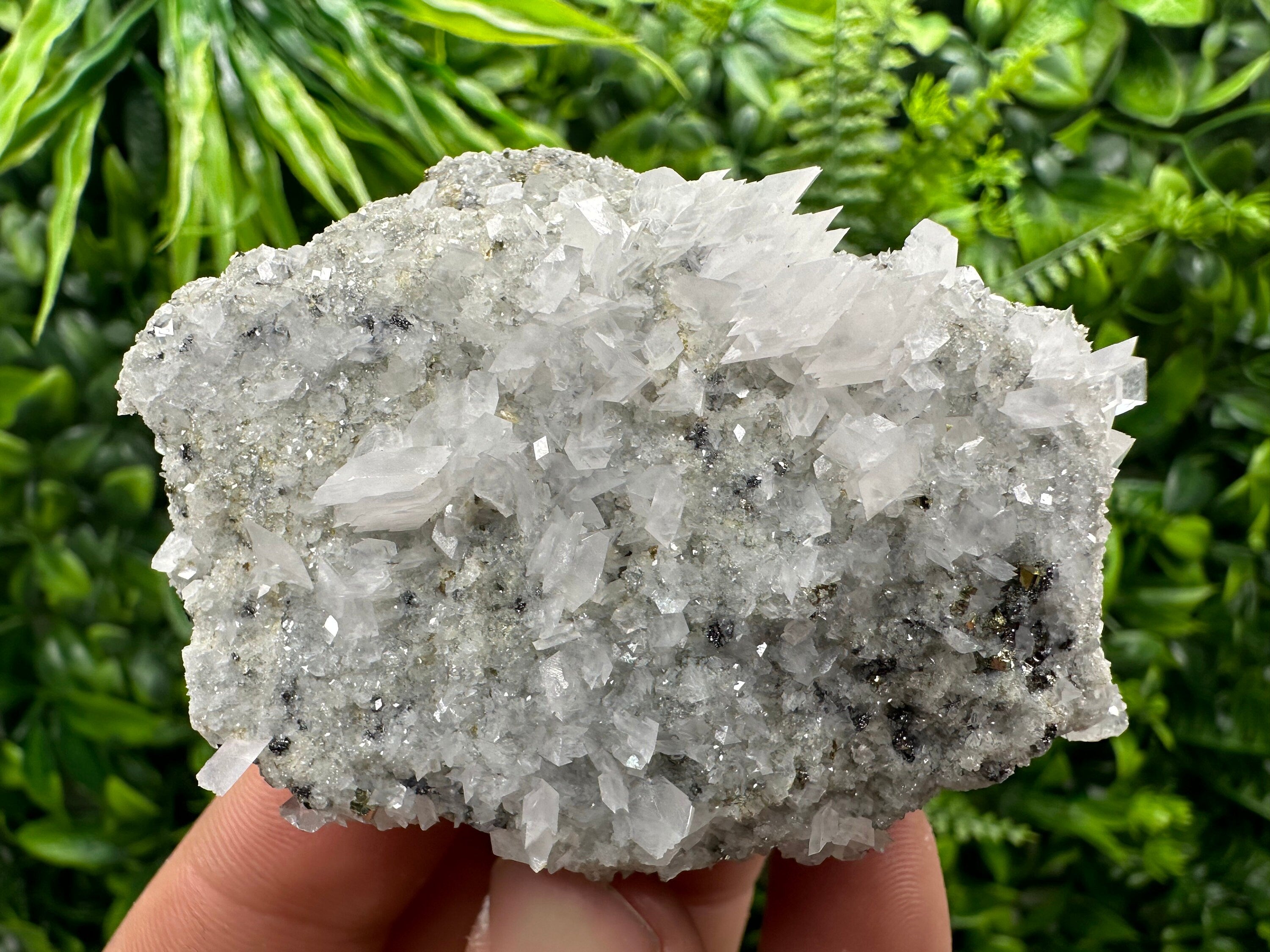Calcite & Pyrite on Quartz Crystal: Borieva Mine, Bulgaria
