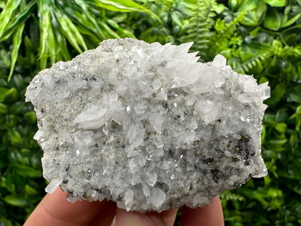 Calcite & Pyrite on Quartz Crystal: Borieva Mine, Bulgaria