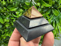 Polished Shungite Pyramid, Sacred Geometry, EMF Protection whit copper peak 5 cm