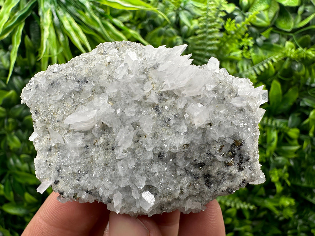 Calcite & Pyrite on Quartz Crystal: Borieva Mine, Bulgaria